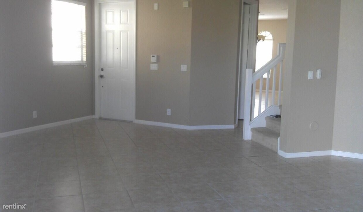 Primary Photo - 4 br, 2.5 bath Condo - 16122 Poppyseed Cir...