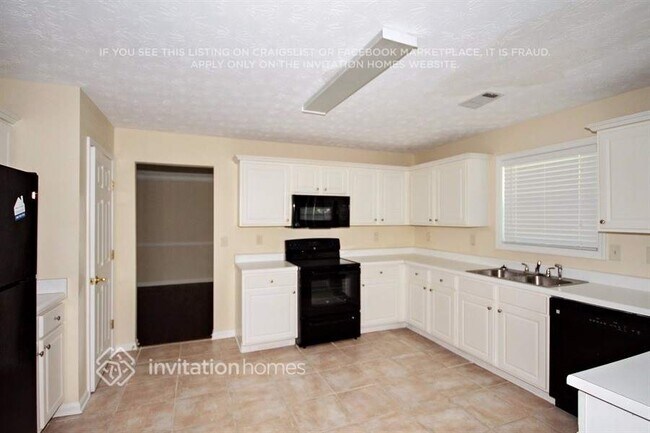 Foto del edificio - 6521 Carriage Ln