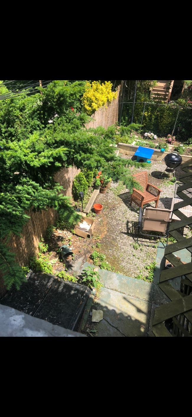 Backyard - more to come, old photo much nicer now - 319 73rd St