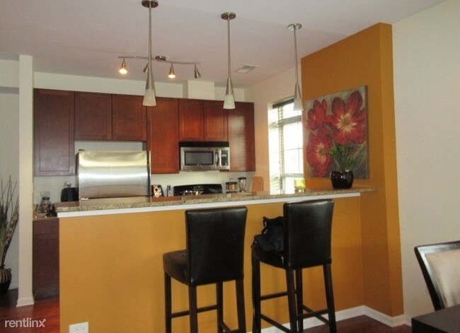 Foto del edificio - 3843 S Langley Ave