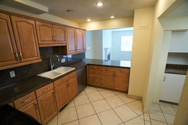Kitchen with Updated Countertops and Cabinetry - 1797 S Laurelhurst Dr