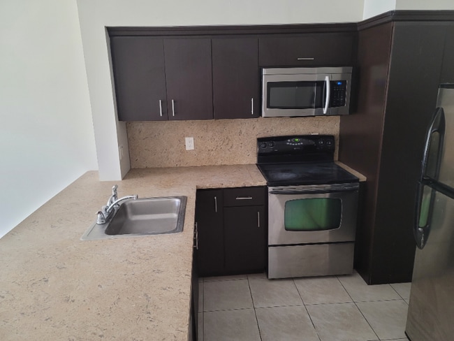 Photo - 3700-3730 N Pine Island Rd Apartment