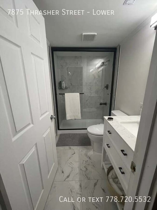 Photo du bâtiment - Cozy 1 Bedroom Lower Suite