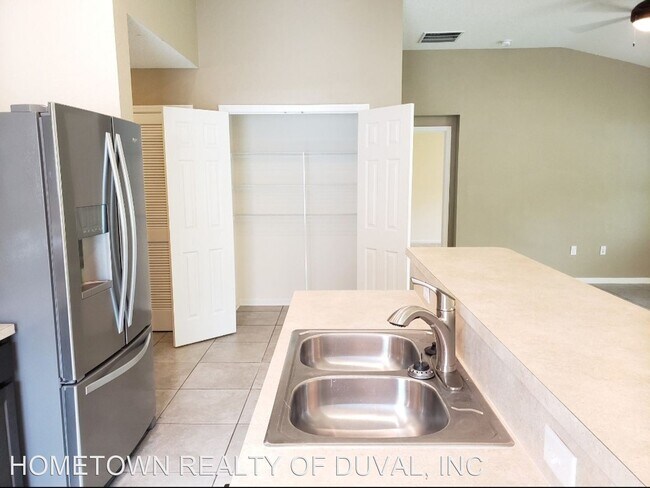 Building Photo - 4 br, 2 bath House - 7634 Fanning Dr.