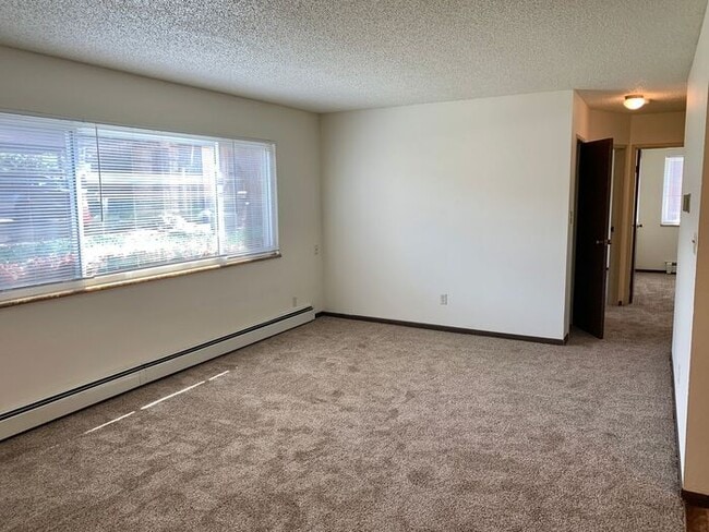 Photo - 2 Bed, 1 Bath Apartment for Rent in East Loveland! Move in special - 2 Weeks Free, Flexible lease...