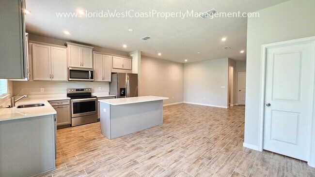 Building Photo - SUPER 3 BEDROOM/2.5 BATH TOWNHOME AVAILABLE IN HARMONY! TERRIFIC LWR LOCATION!