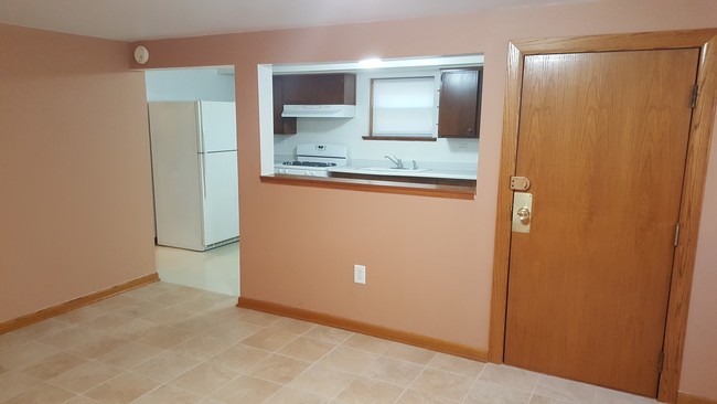 Living room with view of kitchen - 6313 W Montrose Ave