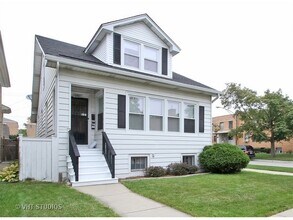Building Photo - 6802 W Highland Ave