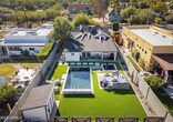 Aerial view of fully remodeled backyard (patio set not included) - 928 E Whitton Ave