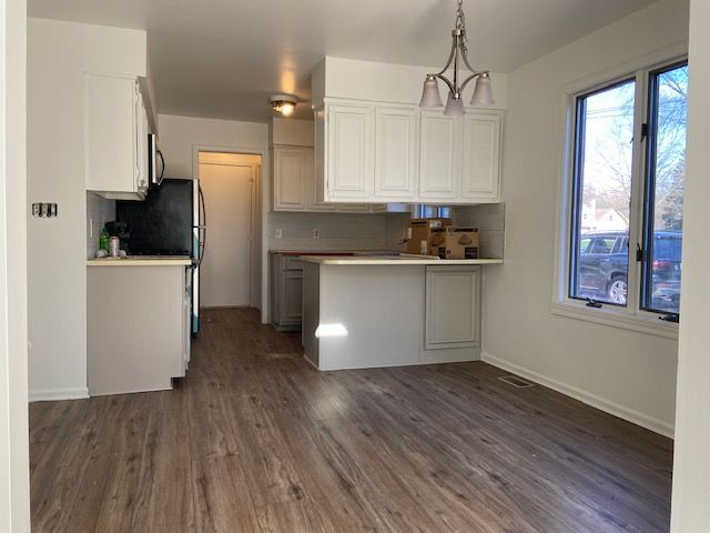 Kitchen with breakfast nook - 49135 9 Mile Rd