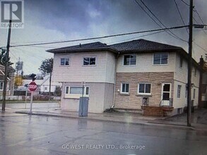 Building Photo - 402-402 Fares St