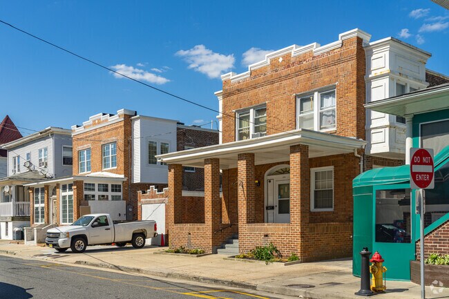 Ducktown features large classic Four Square homes with small attached driveways.
