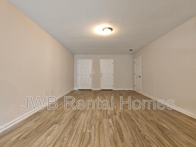 Building Photo - 7863 Playschool Ln