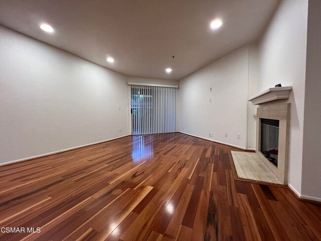 Building Photo - Welcome to this beautifully situated first-floor end unit