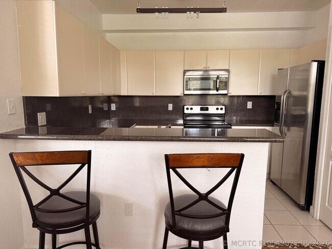 Building Photo - 130 Jacaranda Country Club Dr
