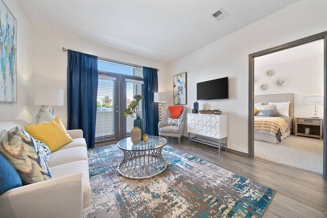 Charming Living Room with Hardwood-Style Flooring - Brunswick Point Apartments