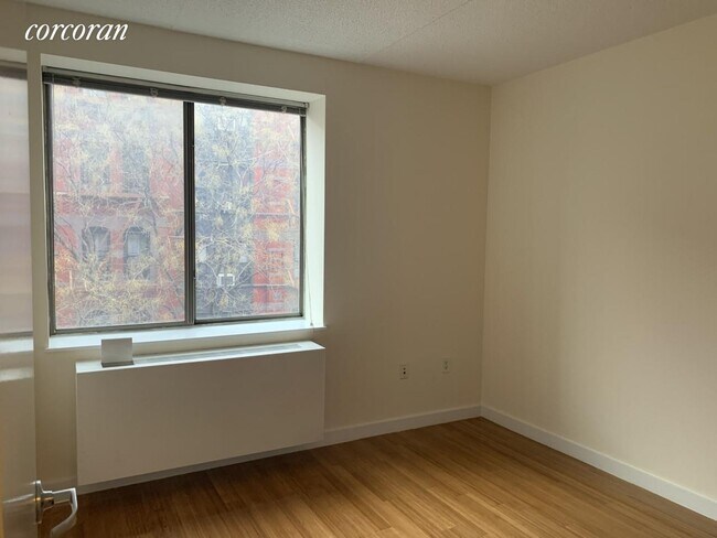 Foto del edificio - 205 W 119th St