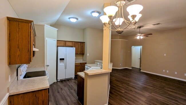 Kitchen and living area - 1718 Wood Creek Dr