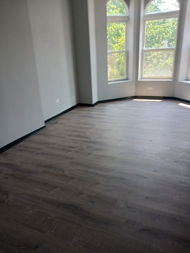 Remodel front room new flooring - 2210 W Washington Blvd