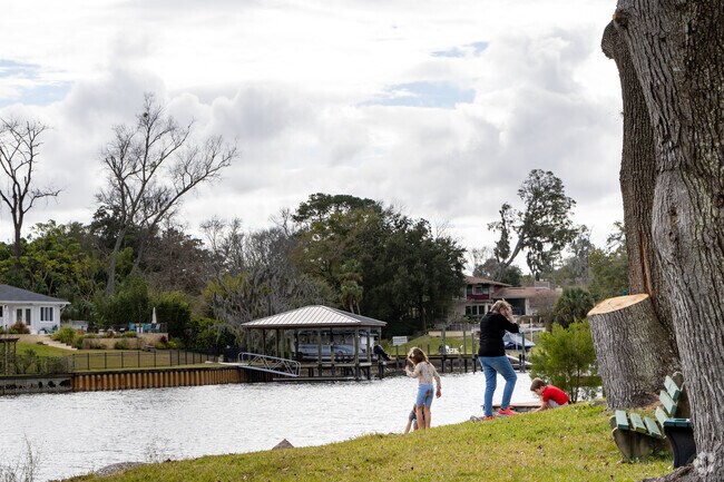 Local families of Saint Nicholas play at Empire Pointe boat ramp.