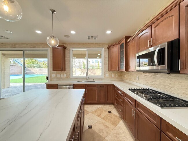 Building Photo - COMING SOON!  Gated 4BD/3BA home near Red Rock Casino! Sits on a huge corner lot!