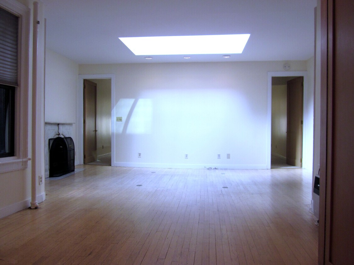 Living/Dining with Working Fireplace and Large Skylight - 127 West 56th Street