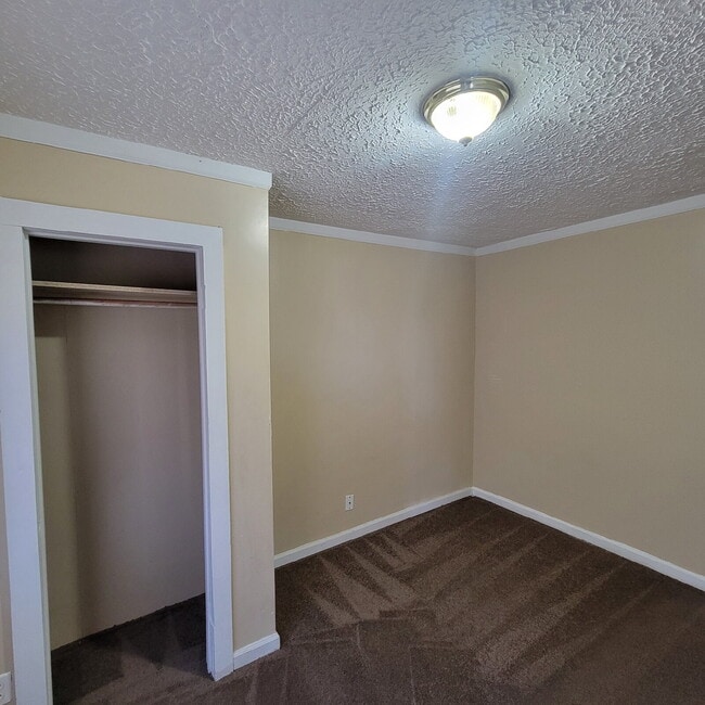 Building Photo - Brightwood 2BR House w/Storage Shed!