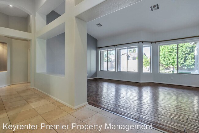 Building Photo - 4 br, 2 bath House - 7180 W Trails Dr