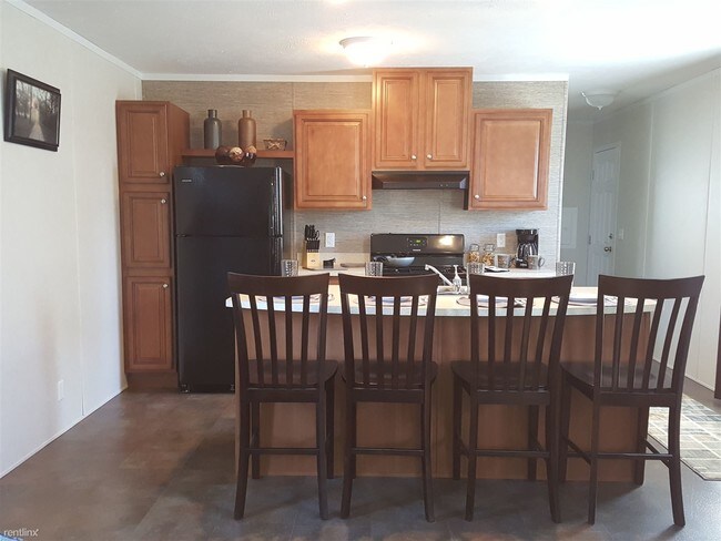 Foto del edificio - 3 br, 2 bath Mobile Home - 909 S Lawrence St