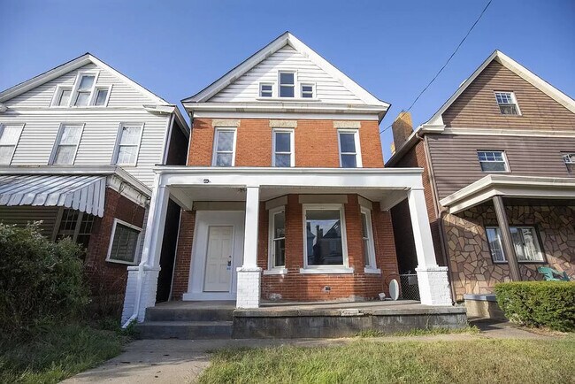 Building Photo - 709 E 14th Ave