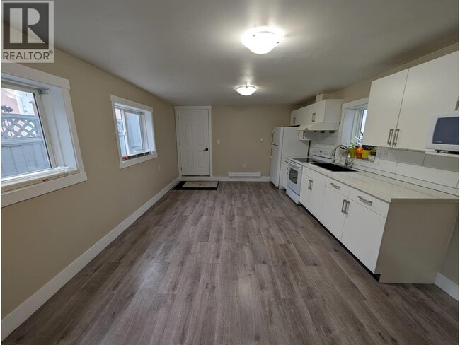 Building Photo - 1XXX E 64th Ave