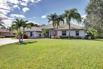 Building Photo - 8028 Plantation Lakes Dr