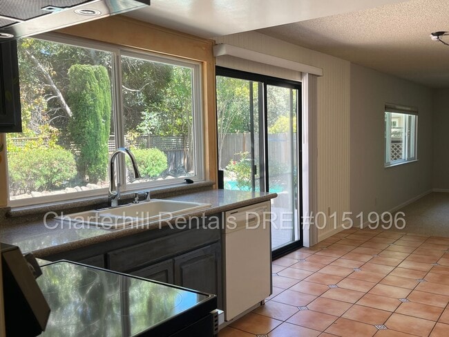 Building Photo - **Spacious 4-Bedroom Home with Pool in Desirable Rincon Valley**