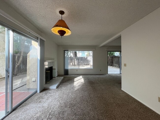 Building Photo - Chatsworth 3+2.5 w/backyard, fireplace + 2...