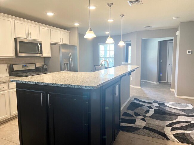 Foto del edificio - 3106 Rock Rose Ln