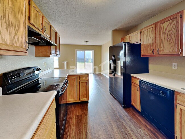 Foto del edificio - 5719 Wood Hollow Dr