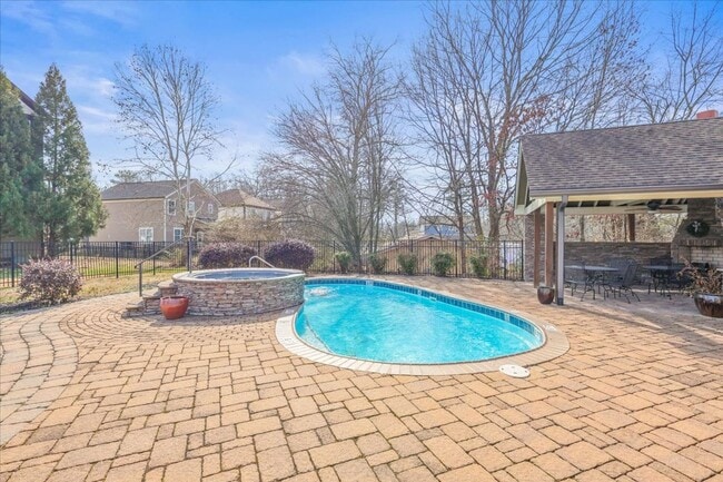 Building Photo - Your New Home! 3 Beds, 2.5 Baths, Hardwood Throughout, Fenced Back Yard, 3 Patios, + Community Pool!