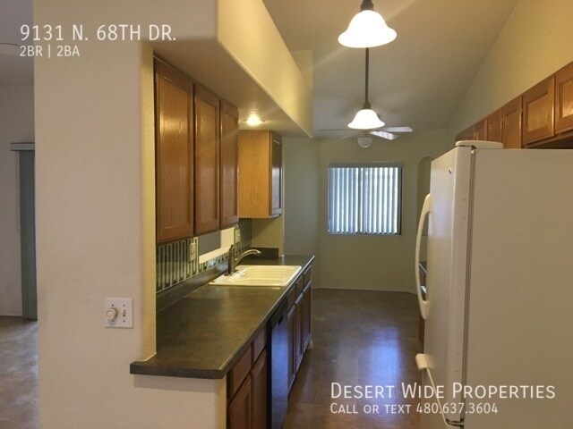 Building Photo - 9131 N 68th Dr