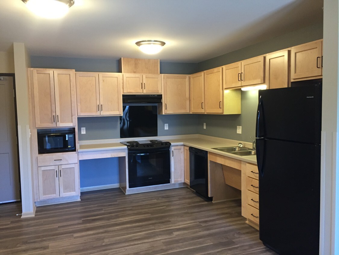 Cocinas espaciosas - Coral Ridge Senior (55+) Apartments