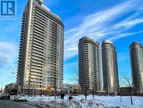 Building Photo - 181-1181 Village Green Square