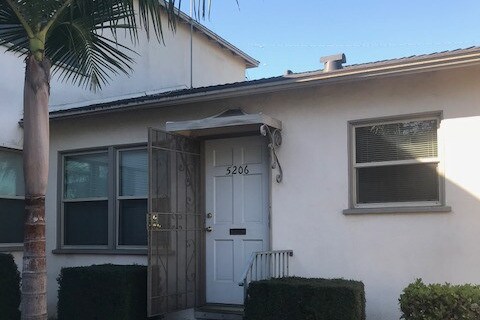 Entry off gated courtyard -no one above - 5206 Knowlton St
