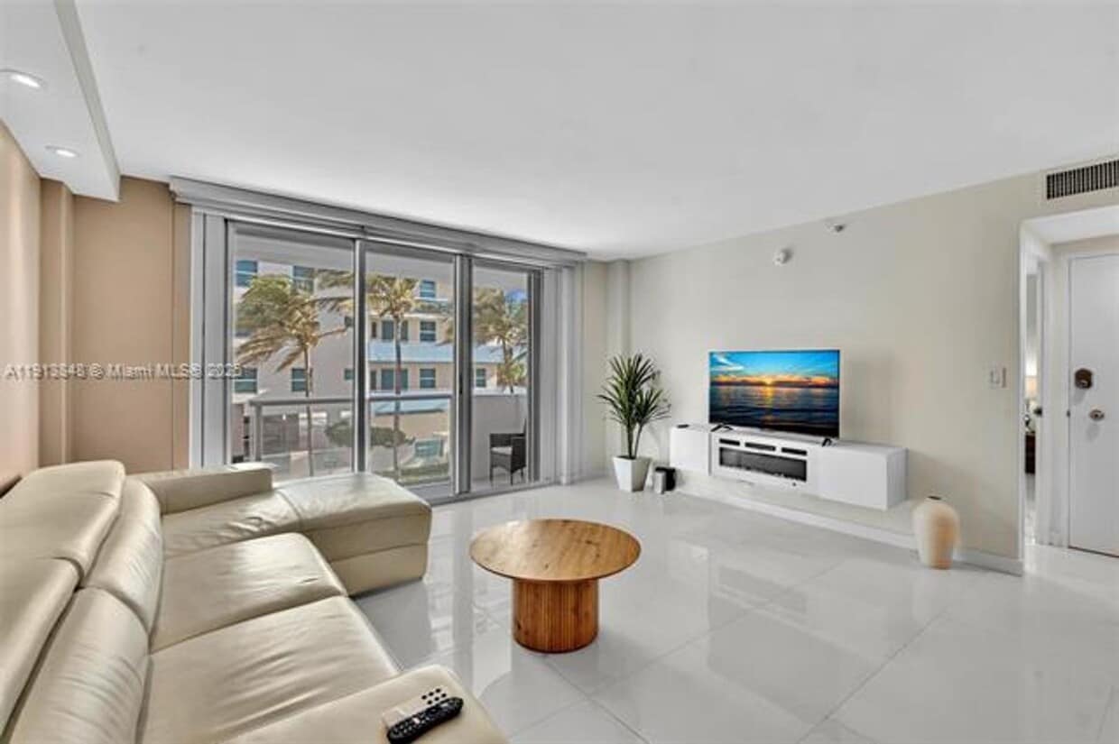 Photo - 9195 Collins Ave appt 303 (A11913848)