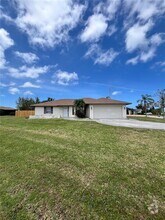 Building Photo - 9757 Gulfstream Blvd