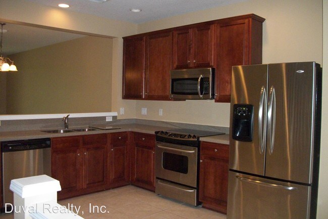 Building Photo - 7009 Roundleaf Dr