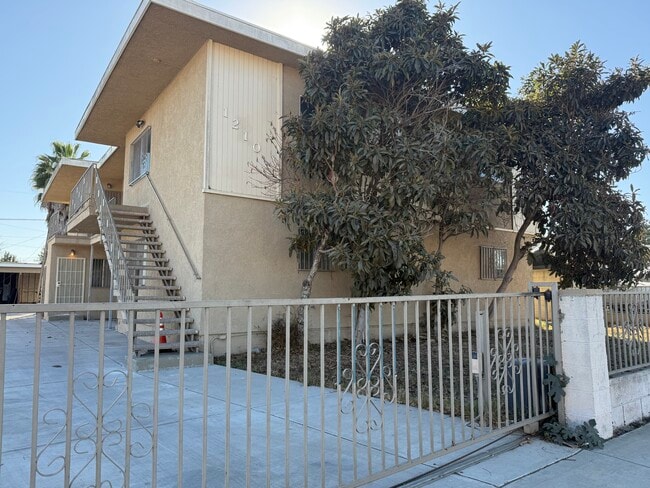 Building Photo - 1210 W 104th St