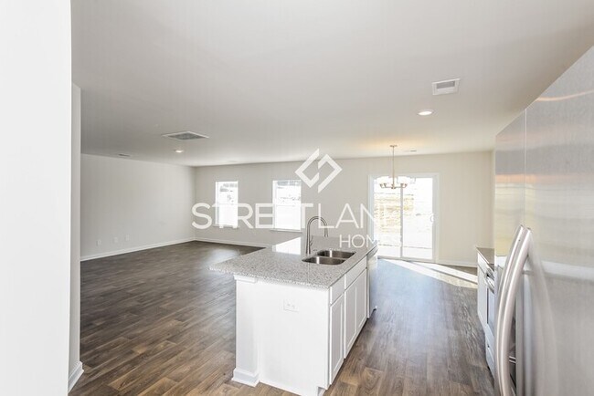 Building Photo - Now offering $1500 off first full month!