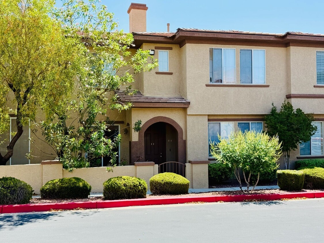 Primary Photo - Immaculate and Inviting Two-Story Condo in...
