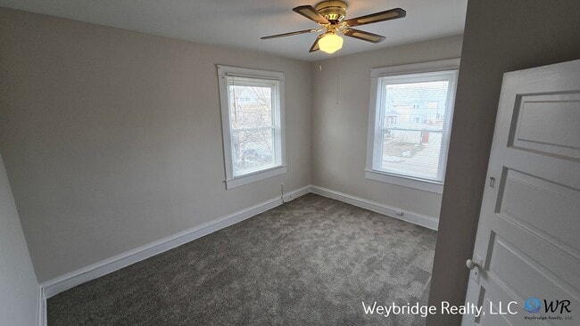 Foto del edificio - Charming 3BR Home in Norwood with Fenced Yard, Detached Garage & Workshop – Prime Location!