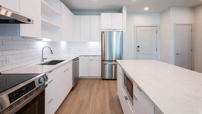 Kitchen with Stainless Steel Appliances - The Basin