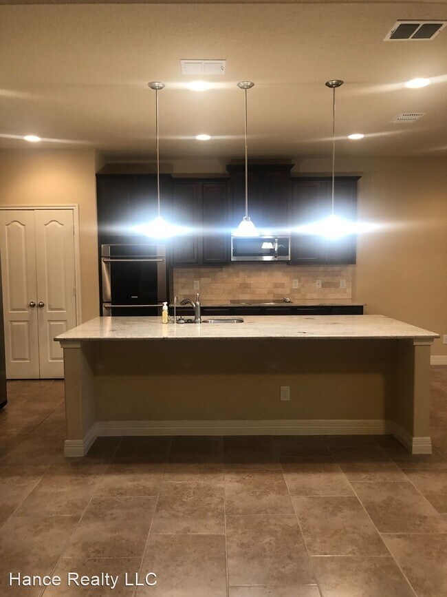 Building Photo - 5 br, 3 bath House - 3112-Half Moon Dr.